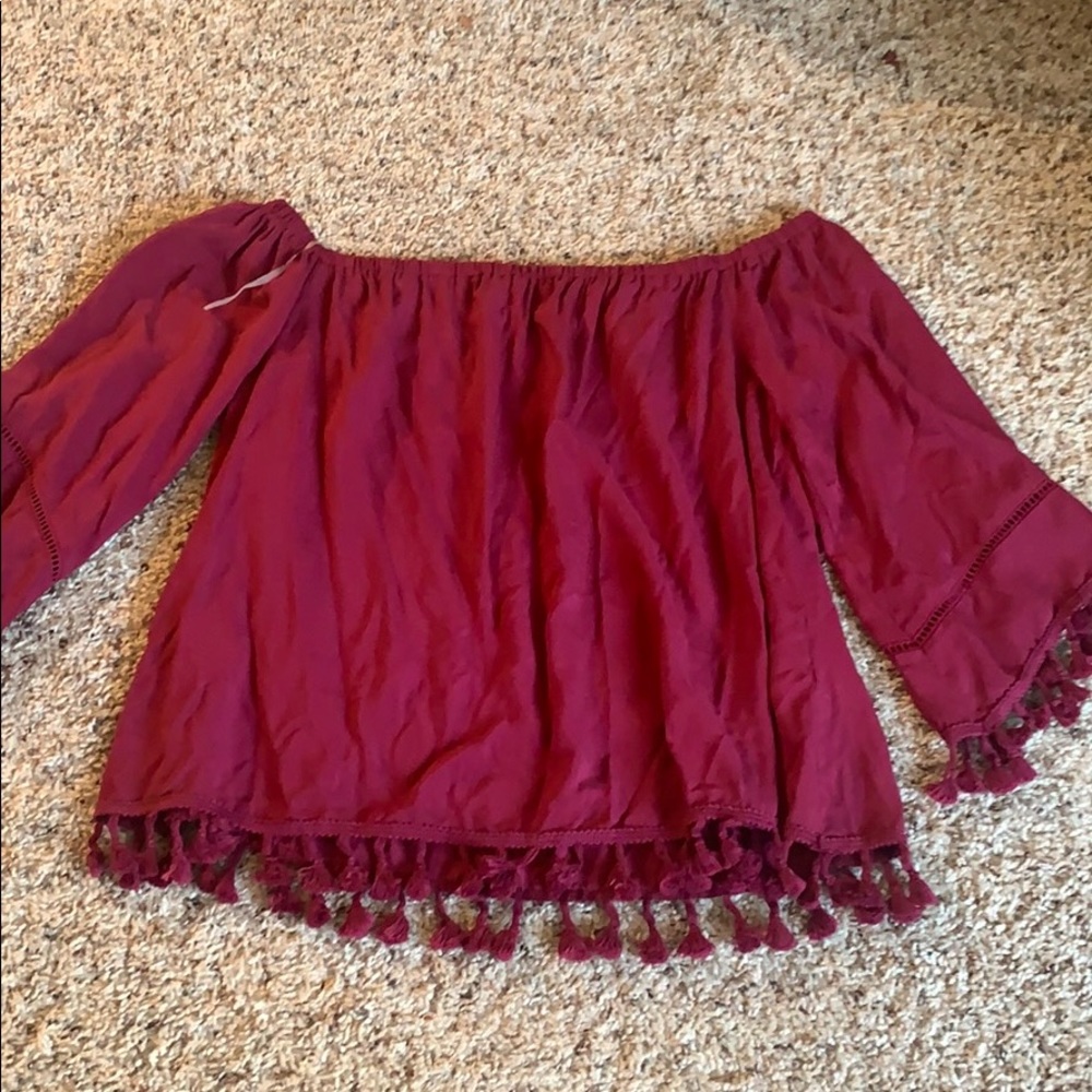 Off the shoulder top with tassels